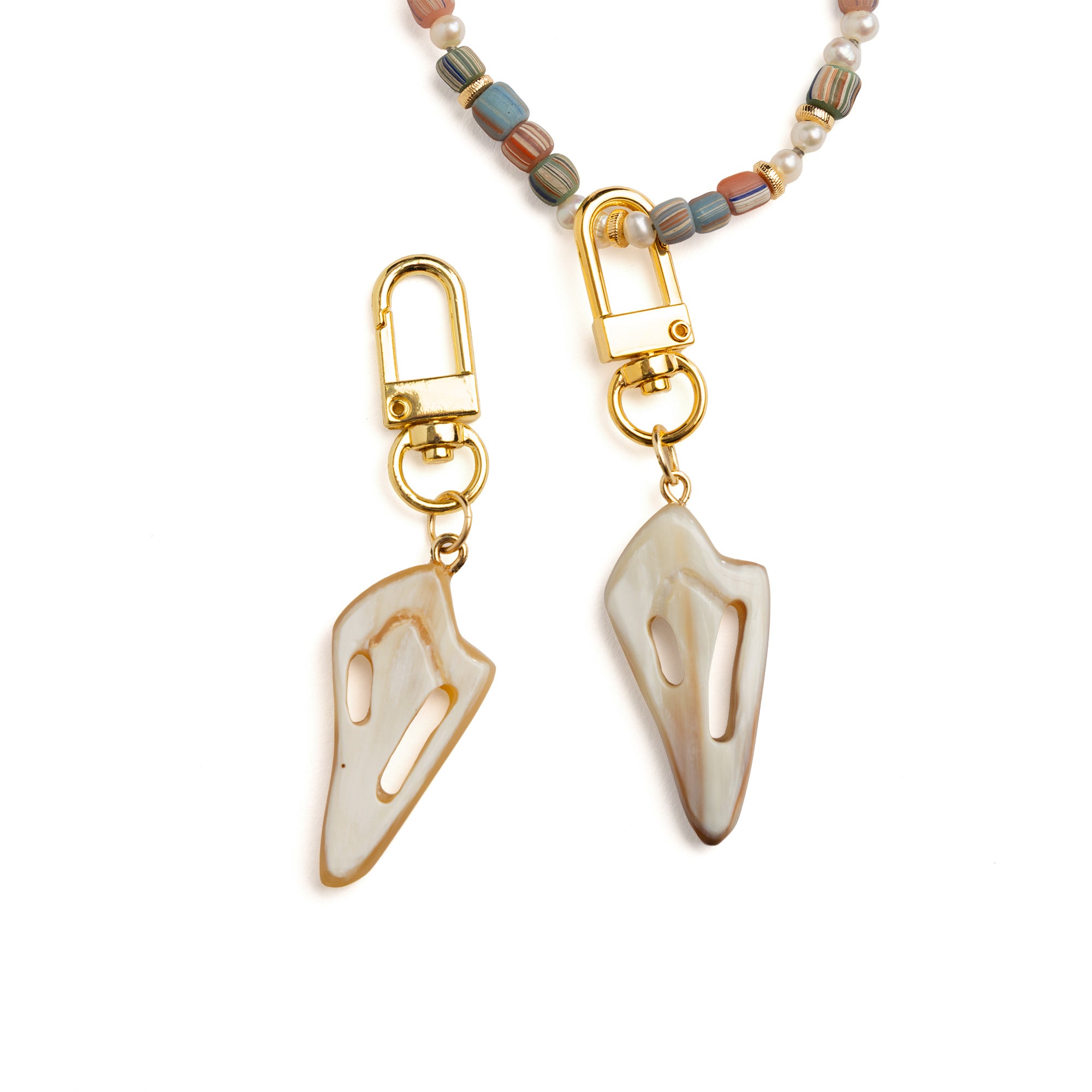 Lilly Sisto x Akola cut conch charm in hand-carved Ankole horn