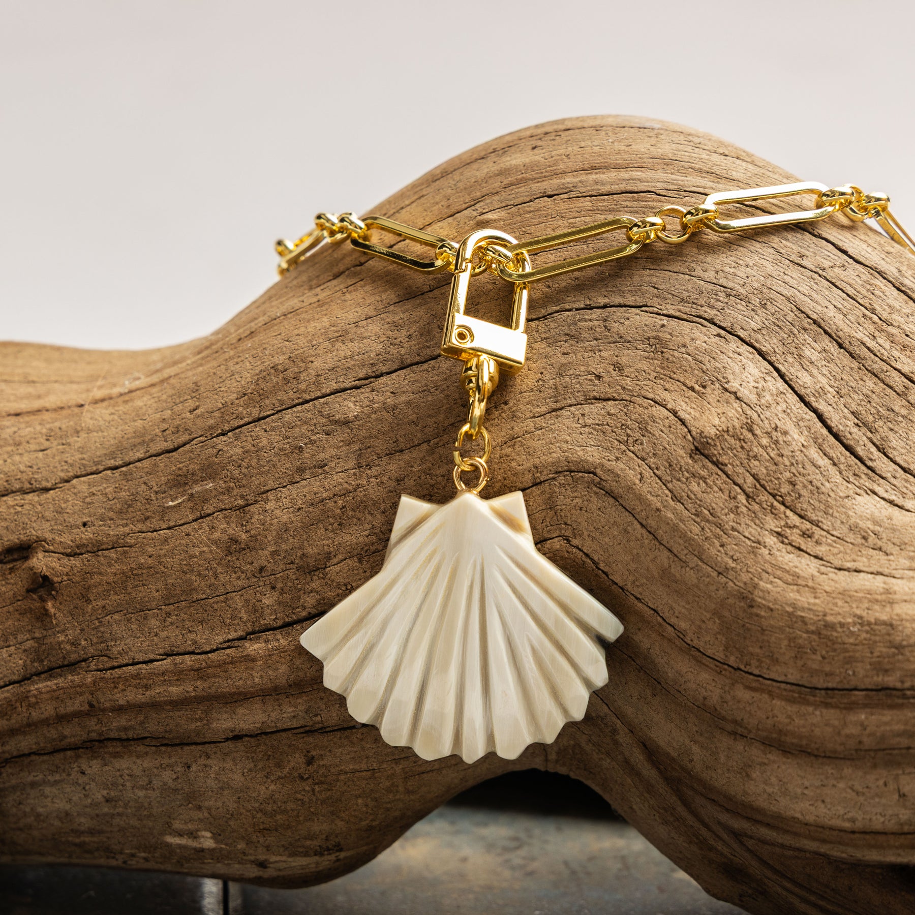 Lilly Sisto x Akola sea shell charm in hand-carved horn