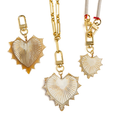 Akola Amara heart charm showing natural Ankole horn tone and pattern