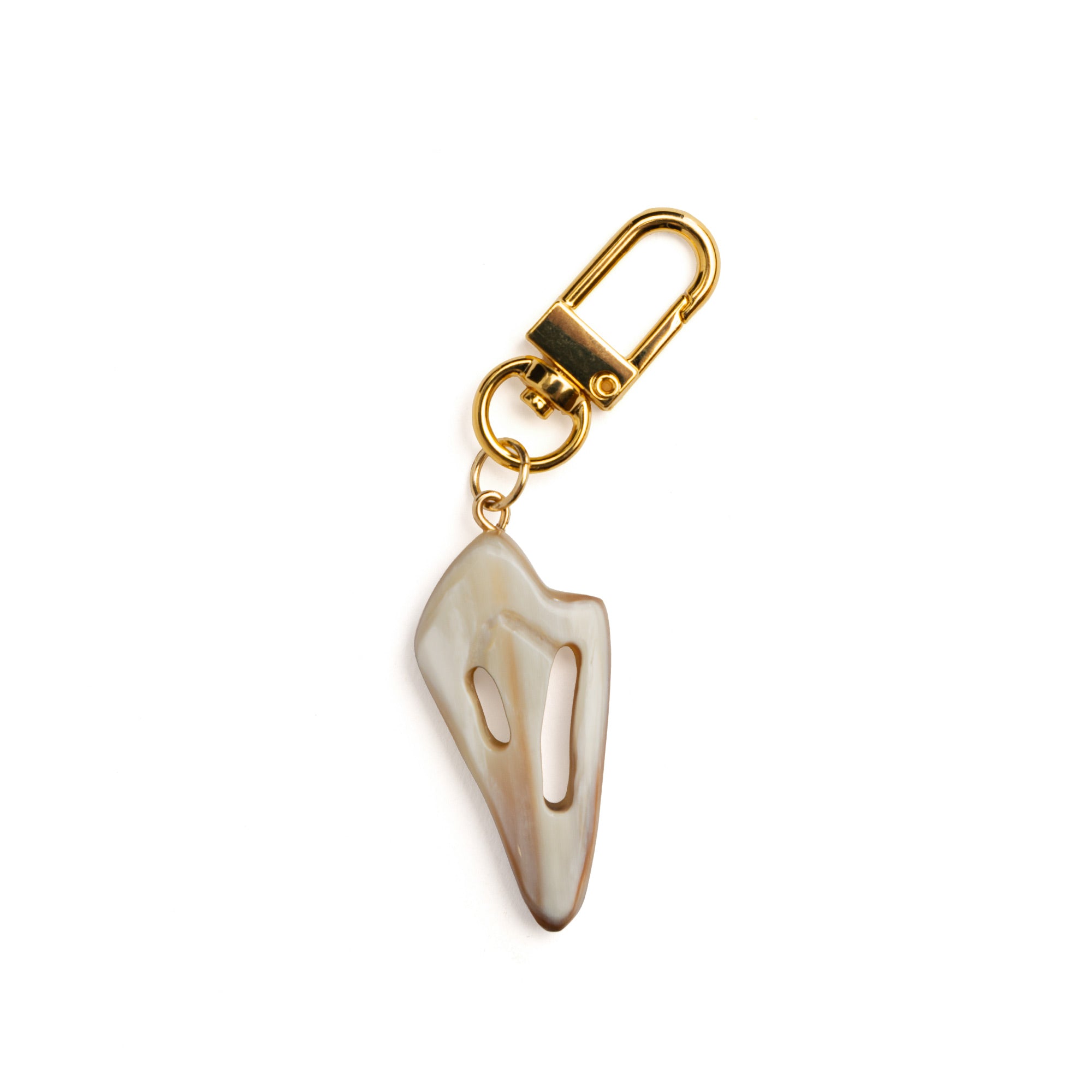Detail of Akola hand-carved cut conch horn charm