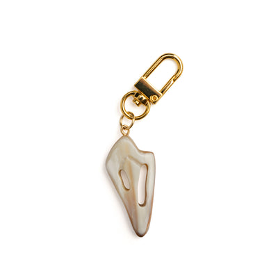 Detail of Akola hand-carved cut conch horn charm