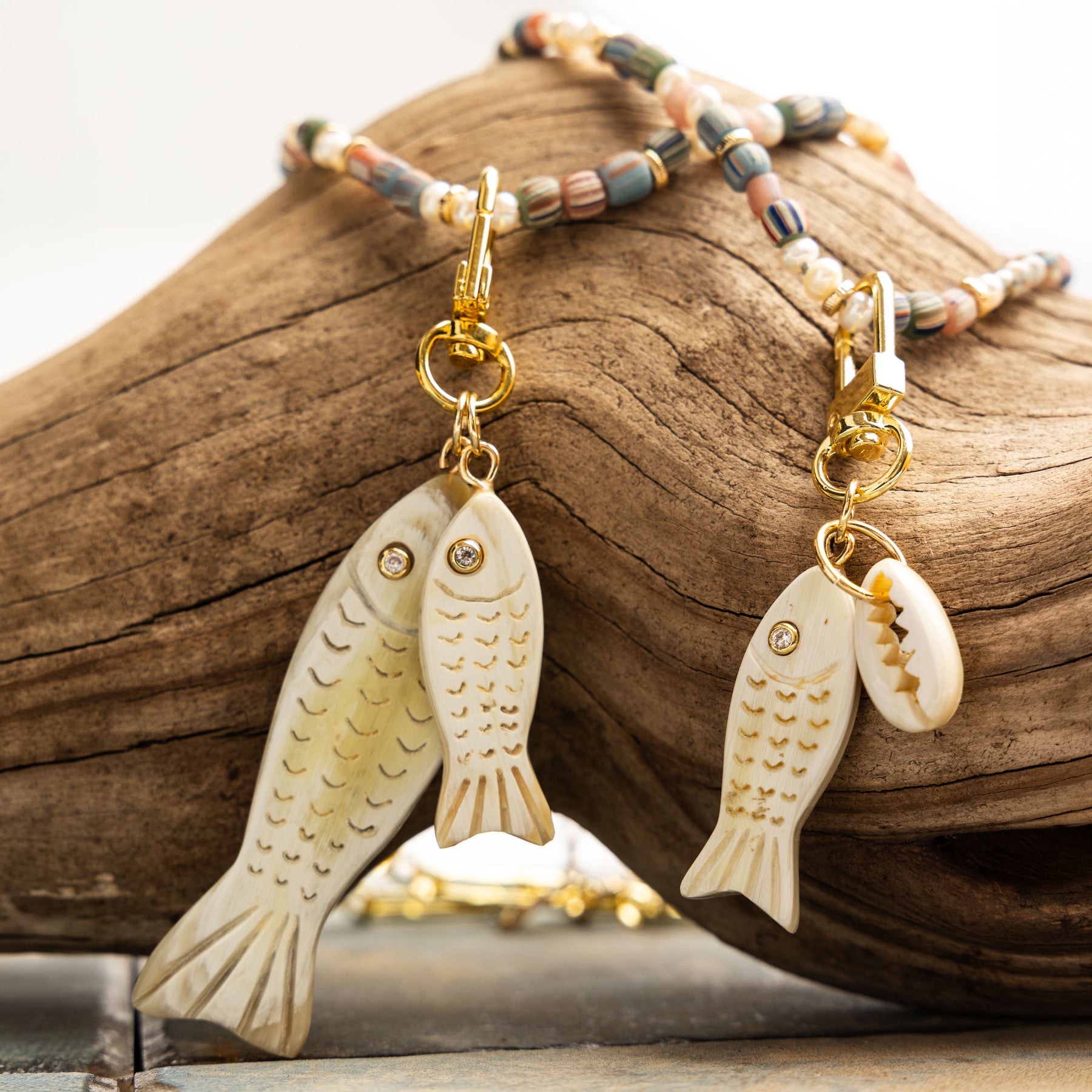 Lilly Sisto x Akola double fish charm in hand-carved horn