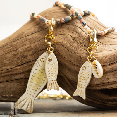 Lilly Sisto x Akola double fish charm in hand-carved horn