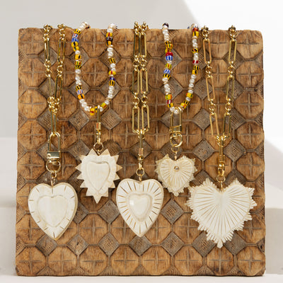 Akola Lucia heart charm hand-carved from horn with gold-plated clasp