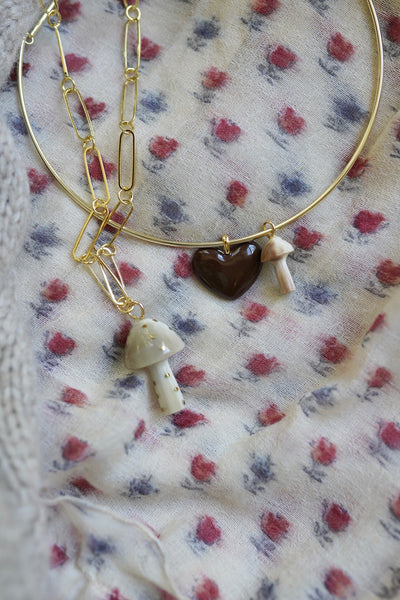 Mushroom Light Horn and Brass Charm by Nicola Bathie