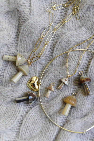Mushroom Light Horn and Brass Charm by Nicola Bathie