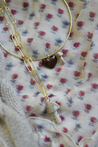 Mushroom Light Horn and Brass Charm by Nicola Bathie