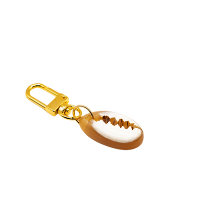 Lilly Sisto x Akola cowrie charm in hand-carved Ankole horn