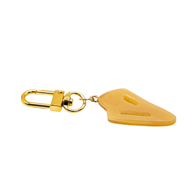 Akola cut conch charm showing the inner spiral cut