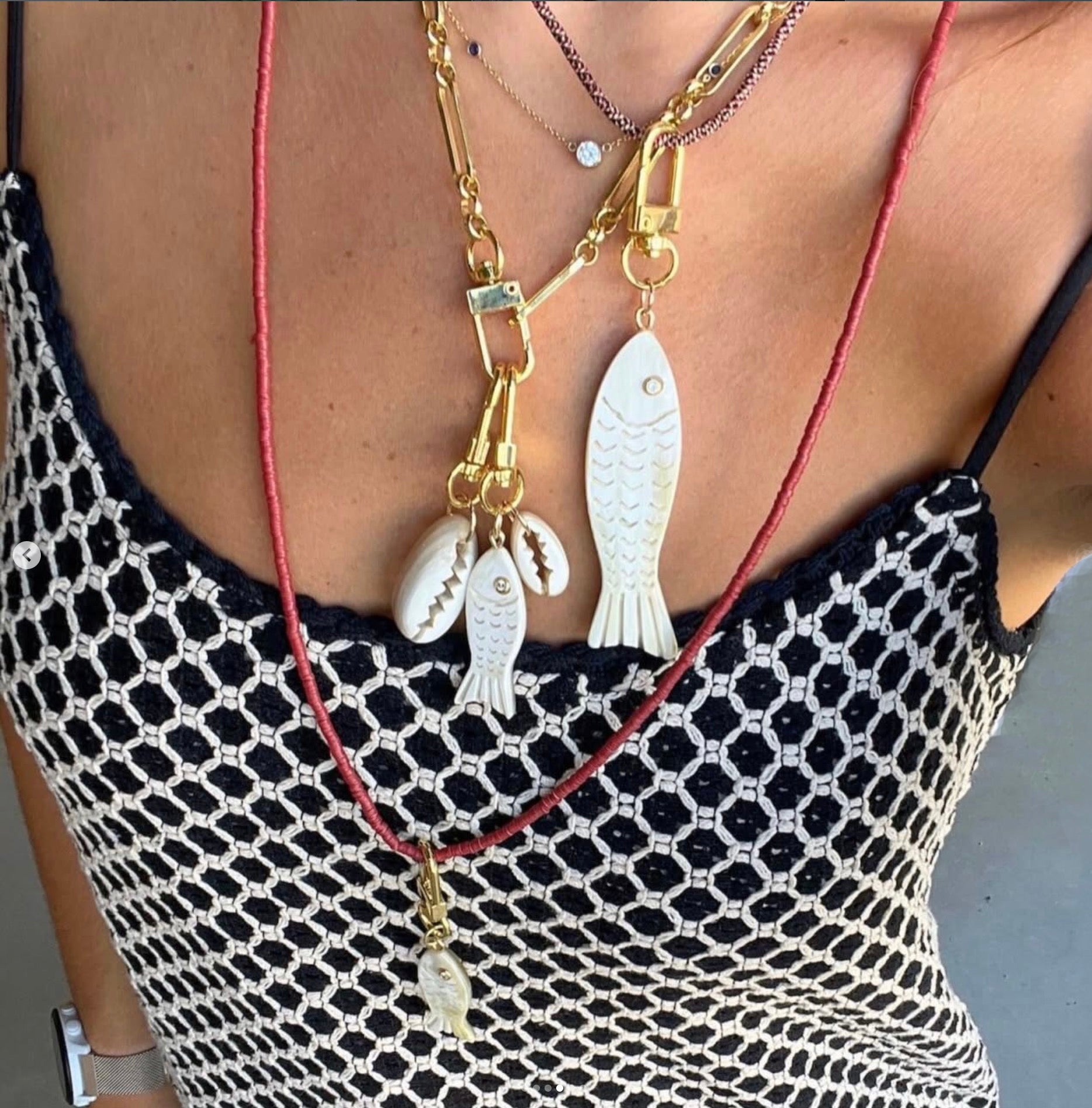 Lilly Sisto x Akola fish charm in hand-carved horn