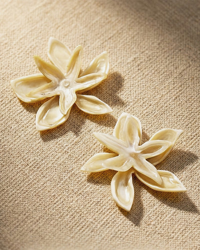 Olaya Earring on a canvas background