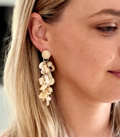 Woman wearing our best selling natural earring 