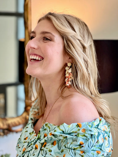 natural color earrings on a style influencer 