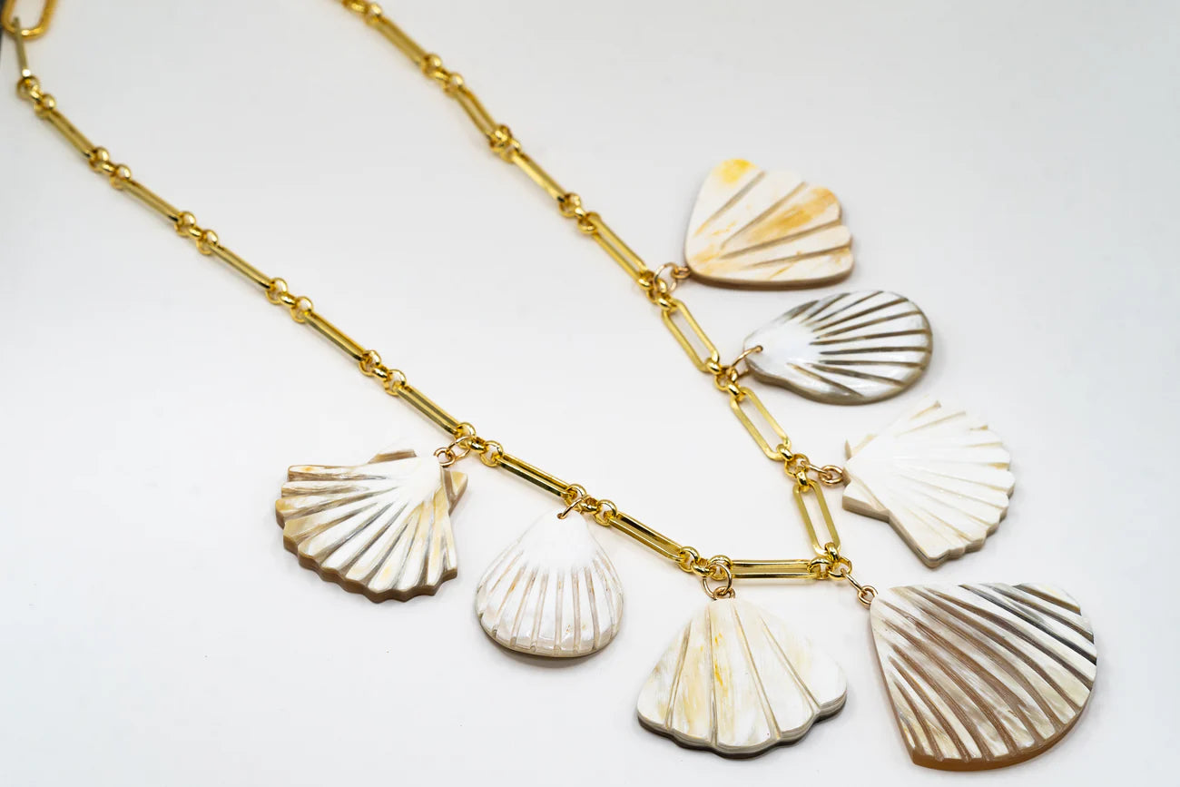 Statement styling of Akola Bahari Collection hand-carved horn charms