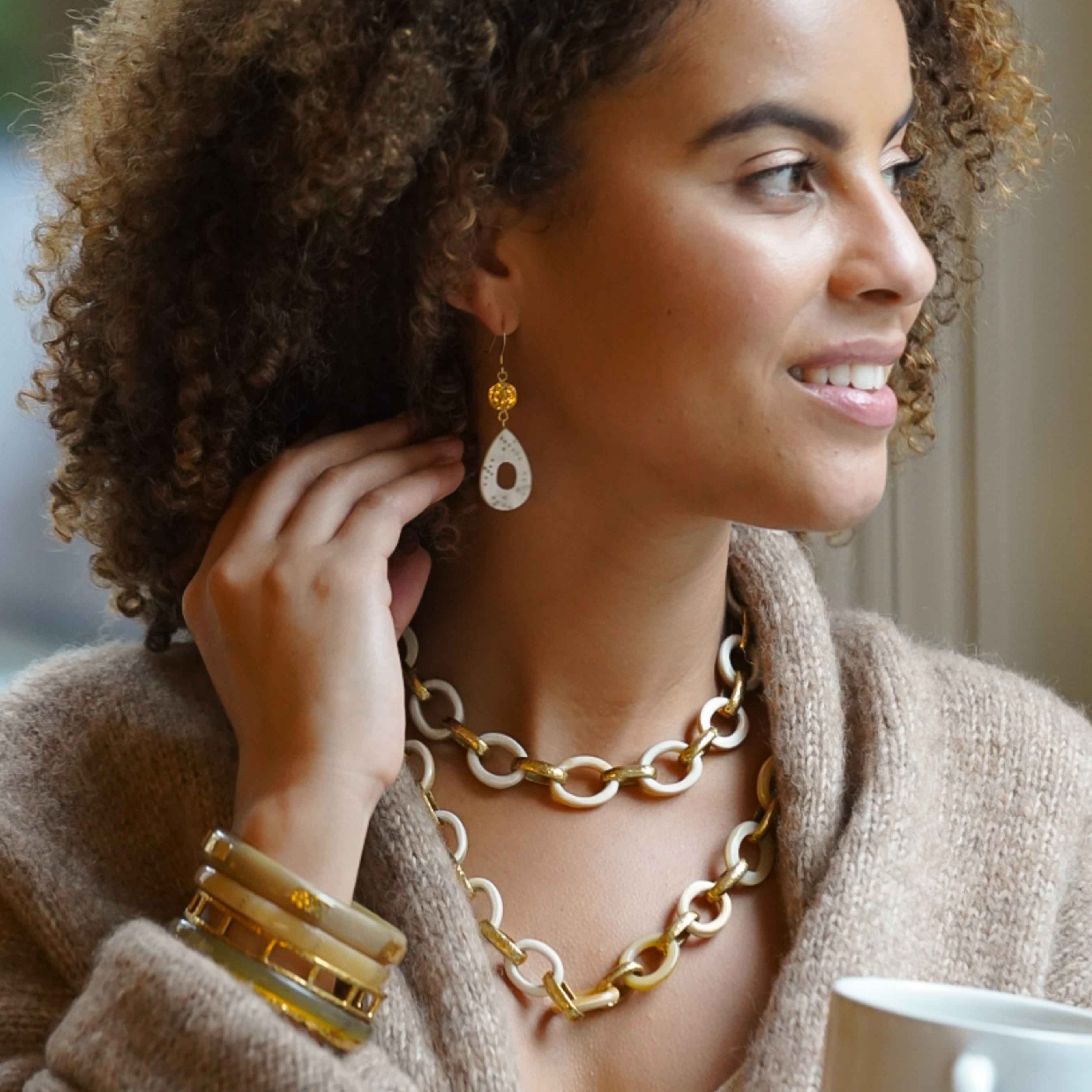 Lauren Free wearing an Akola Jewelry set